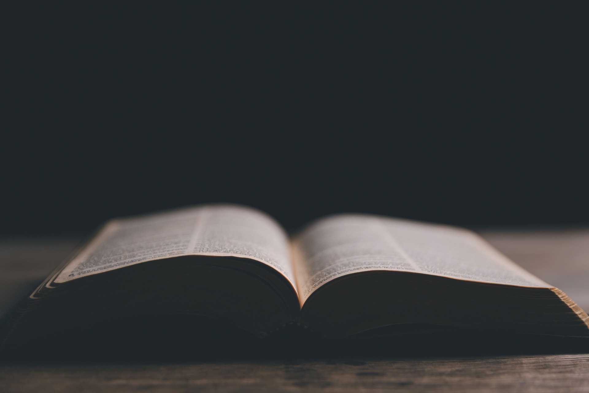 Religious belief concept Close up prayer Christian church service Bible Holy cross Spiritual power Blurred background Desk copy space Heaven God Catholic faith Praise book Jesus worship Gospel symbols